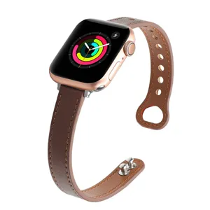 Brown leather watch strap compatible with smart watch, stylish stud buckle replacement band.