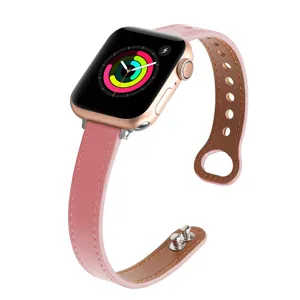 Pink leather replacement watch strap detail with metal rivet closure for smart watch.