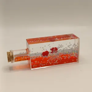 Creative liquid drift bottle ornament desktop decompression toy with star glitter inside.