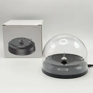 USB powered spinning top toy with clear dome dust cover, desktop decompression gadget ornament.