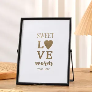 Modern black metal photo frame geometric picture holder for tabletop home decor display.