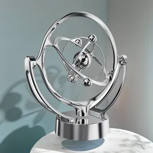 Ornamento da scrivania movimento perpetuo, modello di astrolabio in metallo argentato.