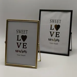 Metal rectangular picture frame table stand with sweet love design cards for home decor.