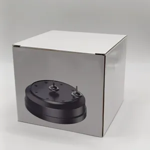 Inception style spinning top ornament packaging box, large black base with dual tops for desk decor.