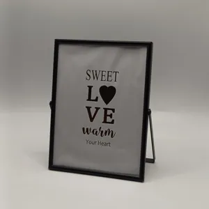 Black metal photo frame for table display, modern rectangular picture frame with stand.