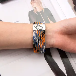 Elastic nylon braided watch band compatible with Apple Watch, featuring cute cat metal buckle.