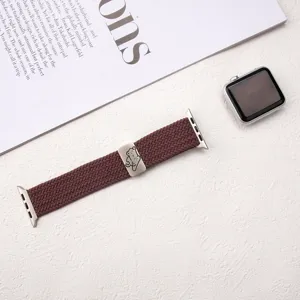 Brown stretch nylon braided watch strap for Apple Watch featuring a cute cat metal charm.