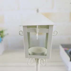 Portacandela a lanterna in ferro bianco stile europeo lampada a vento in vetro casa