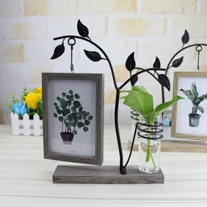 Creative wooden desktop photo frame with glass hydroponic vase and hanging 6 inch picture display.