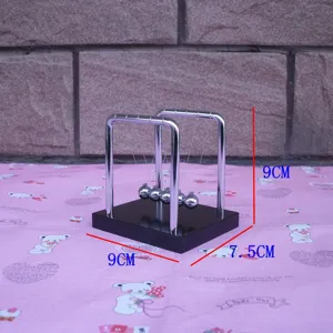 Newton cradle physics science toy metal balance balls desk decoration detail view