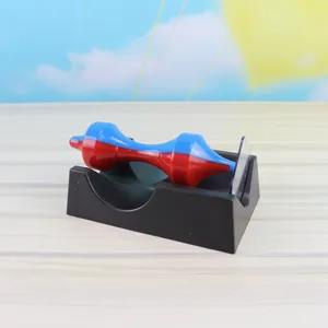 Magnetic levitation gyroscope educational novelty toy with black base and blue red spinning top.