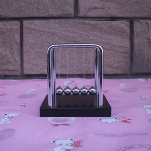 Newton's cradle balance balls physics science pendulum desk toy decoration metal frame base.