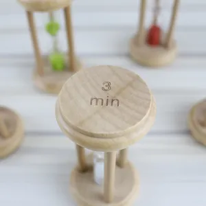 Wooden 3-minute hourglass timer detail shot, creative home decor ornament with natural wood finish.