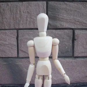 Detailed view of 12-inch wooden artist mannequin for sketch drawing and art design modeling.