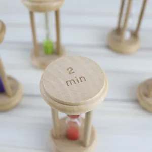 Wooden 2-minute hourglass timer, creative home decor ornament detail view showing natural texture.