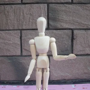Wooden manikin detail view, jointed wooden dummy for art sketching and drawing model use.