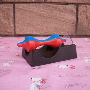 Detailed view of the magnetic levitation gyroscope toy showing its blue and red spinning top.