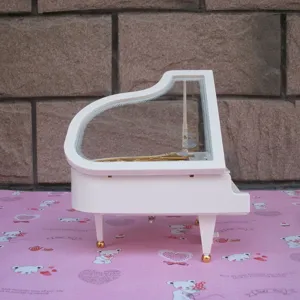 Mini white grand piano music box, creative desktop ornament and cute birthday gift idea for girls.