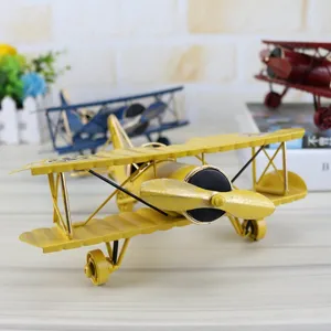 Vintage handmade wrought iron airplane model, large retro metal biplane desktop ornament for home decor.