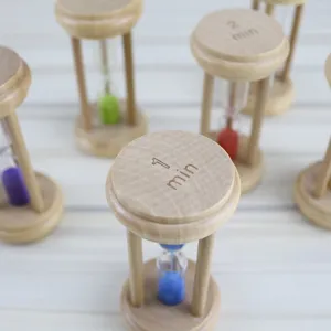 Wooden sand timer detail showing colored sand and minute markings for home decor and time management.