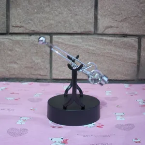 Detail shot of a creative magnetic kinetic art perpetual motion desktop toy ornament.