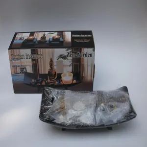 Zen garden incense burner set with resin Buddha statue and tray for home decor relaxation.