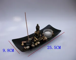 Detail view of Zen meditation incense burner tray set with Buddha figurine and candle holder.