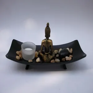 Zen resin Buddha statue decoration set with tray and tealight for home entryway decor.