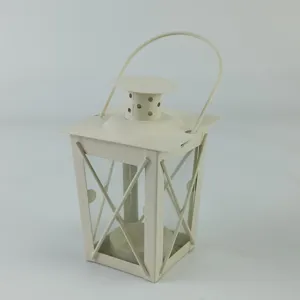 White iron candle lantern detail shot, vintage Moroccan style metal tealight holder home decor.