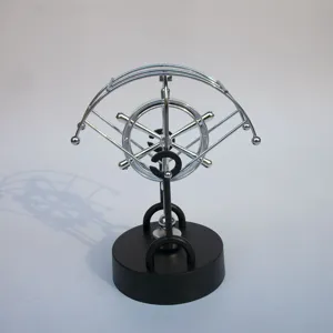 Kinetic art perpetual motion desk toy, science educational decorative ornament for home office.