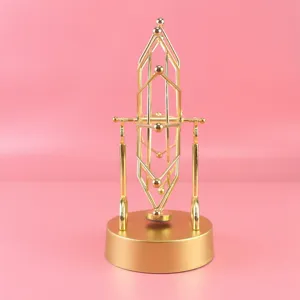 Gold metal perpetual motion machine kinetic art sculpture desk toy home office decor ornament.