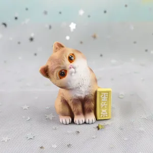Cute resin cat figurine detail shot, perfect for car interior and cake decoration ornaments.