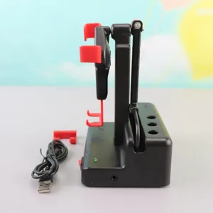 Automatic phone rocker detail showing black base, red holder, USB cable and mechanical arm.