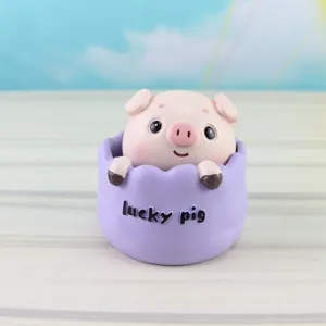 Cute nodding pig resin ornament, creative desktop and car interior decoration gift for friends.