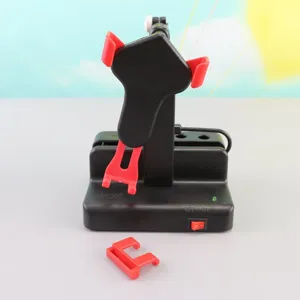 Automatic phone rocker device for steps counter, black and red plastic stand shaker holder.