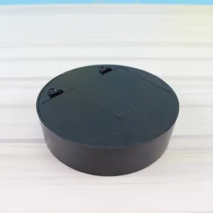 Black plastic battery compartment base detail view for electronic ornament display part