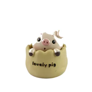 Cute shaking pig resin ornament for car dashboard and home desktop decorations.