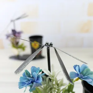 Metal dragonfly pen holder, creative office desk art decoration and student stationery gift.