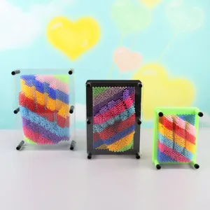 Close-up detail of colorful 3D pin art toy clone mold, multi-color plastic pins in clear frame.