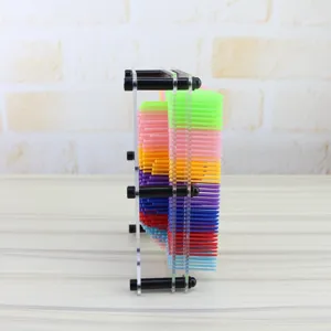 Colorful 3D pin art toy side view detail showing vibrant plastic needle columns and clear frame.