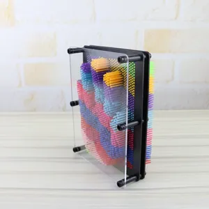 Colorful 3D pin art toy detail view, fun impression board close up desktop display.