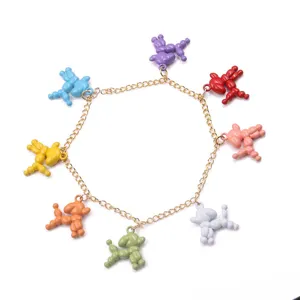 Colorful balloon dog charm bracelet with gold chain, cute animal jewelry for women and kids.