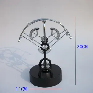 Detail view of the metal perpetual motion desk kinetic sculpture showing size and structure.