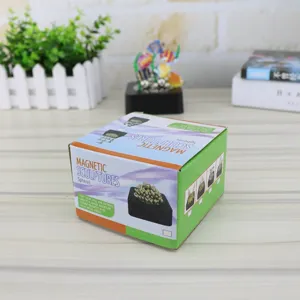 Magnetic sculpture desktop ornament with strong base and metal spheres for creative play.