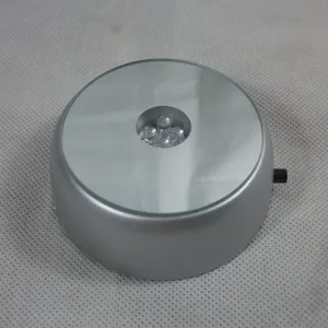 Round 7cm silver LED display base with mirrored surface and four lights for crafts.
