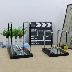 Newton cradle balance balls with wooden base and mirror for office desk decoration gift item.