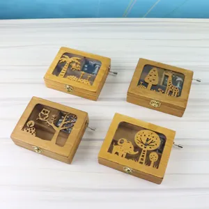 Large wooden hand-cranked music box featuring cute forest animal carved designs for gifts.