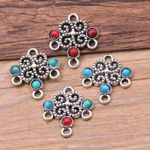 Alloy hollow floral multi-hole jewelry connector charm with colorful resin inlay details.