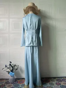 Light blue long sleeve top and long skirt two-piece set, elegant retro women's spring outfit.