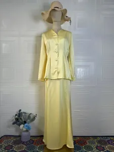 Elegant yellow long sleeve top and long skirt set, vintage style outfit for women spring.
